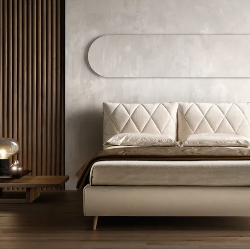 Letto imbottito con testiera trapuntata regolabile Soft di Bside